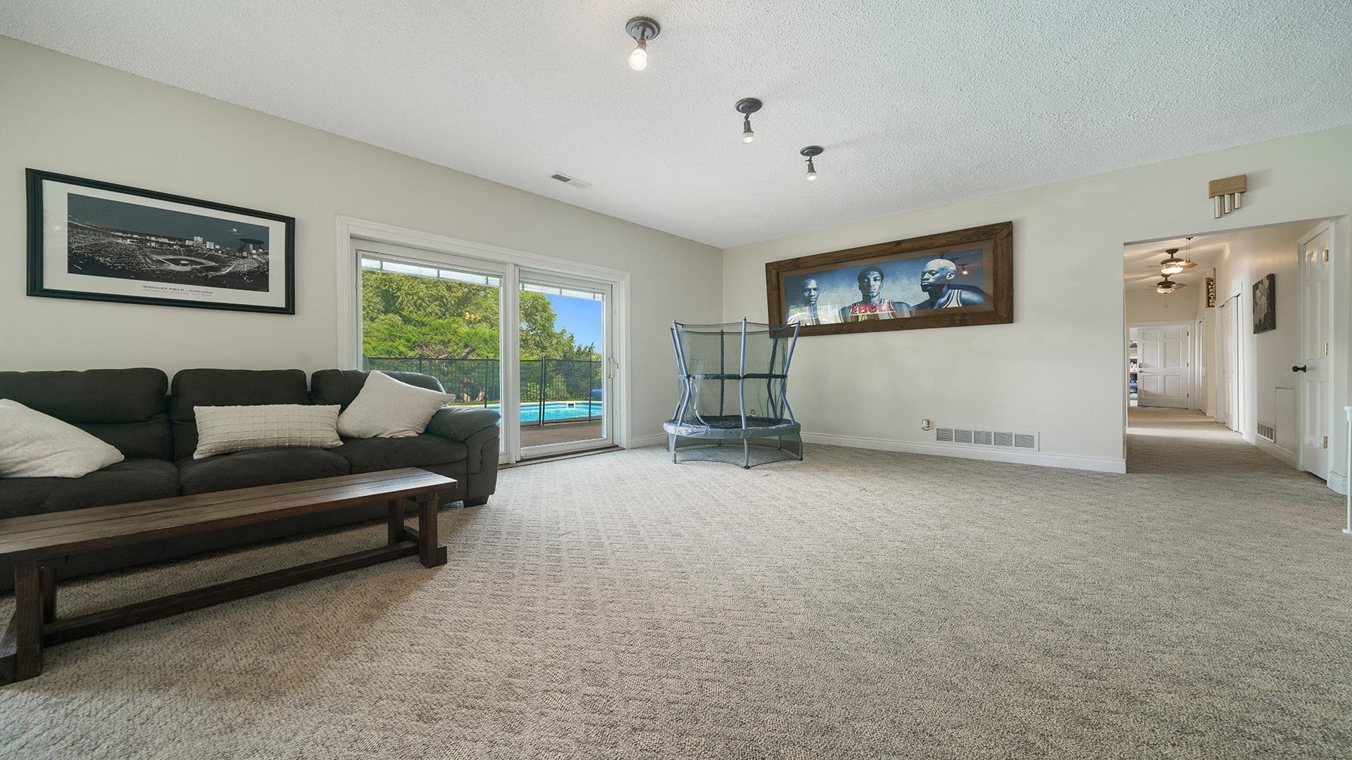3300 North Silver Ridge Drive Oregon, IL 61061 - Photo 33 of 56 a living room with furniture and a flat screen tv