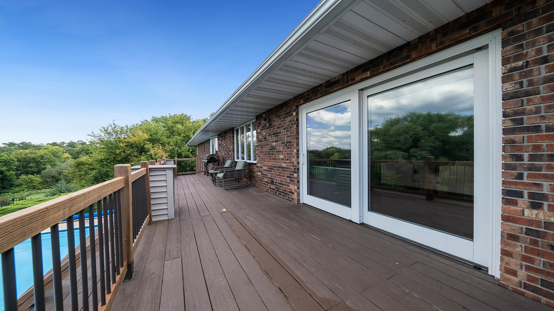 3300 North Silver Ridge Drive Oregon, IL 61061 - Photo 42 of 56 a view of balcony with couch and wooden floor