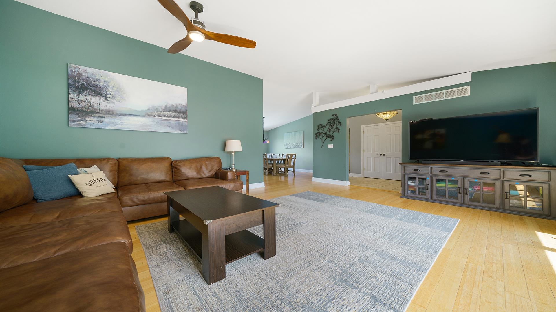 3300 North Silver Ridge Drive Oregon, IL 61061 - Photo 5 of 56 a living room with furniture and a flat screen tv