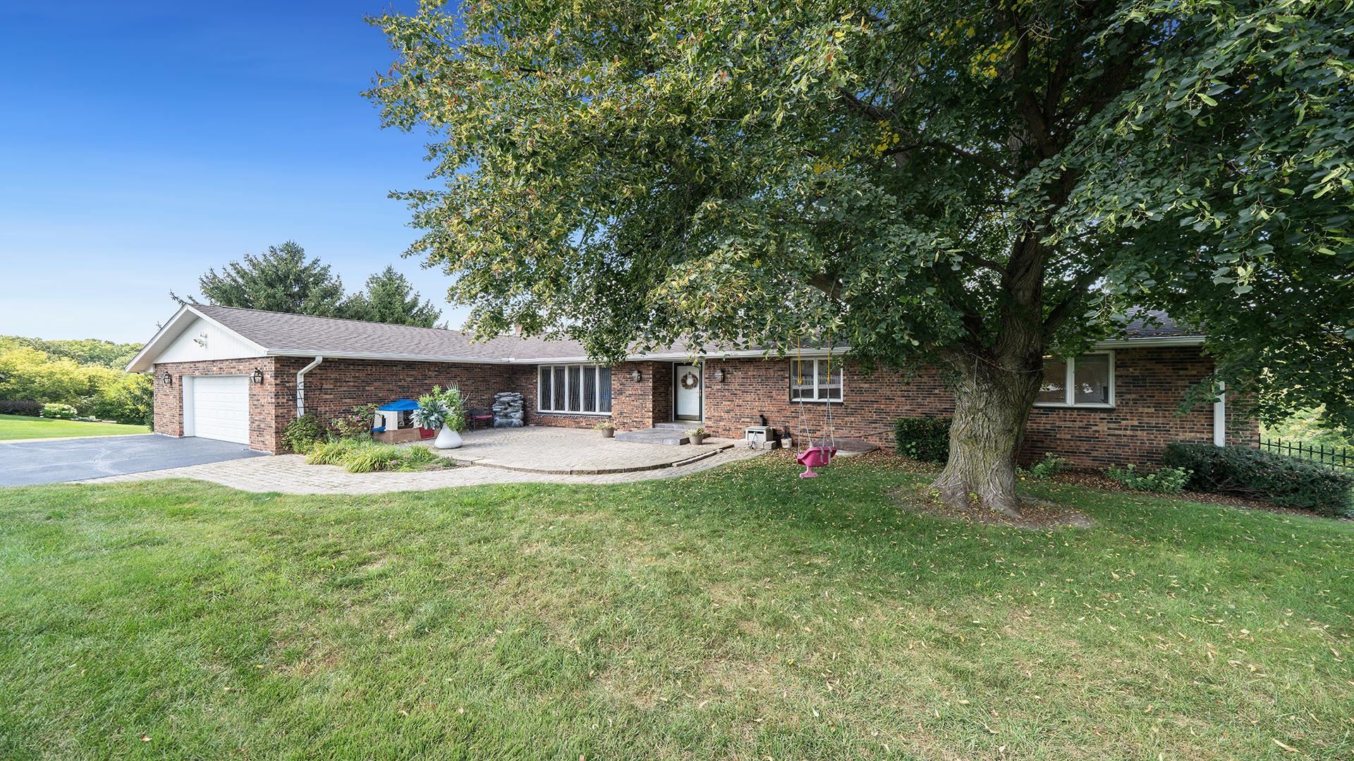 3300 North Silver Ridge Drive Oregon, IL 61061 - Photo 52 of 56 a view of a house with a yard and sitting area