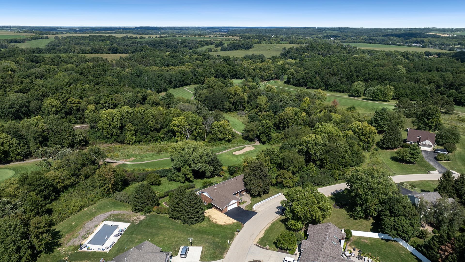 3300 North Silver Ridge Drive Oregon, IL 61061 - Photo 55 of 56 an aerial view of a city with lots of residential buildings