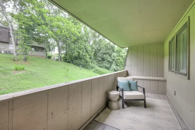 a outdoor living space with furniture and garden view