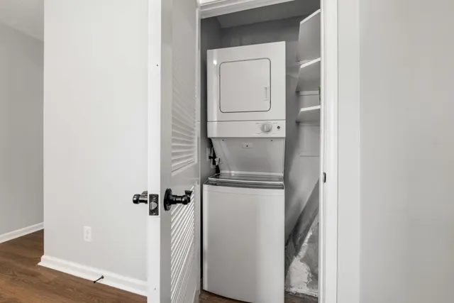 a view of hallway with washer and dryer