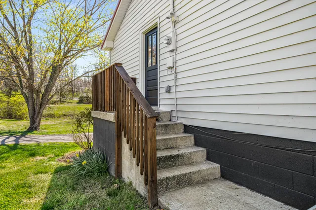 a view of backyard with green space