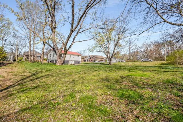 a view of park with trees