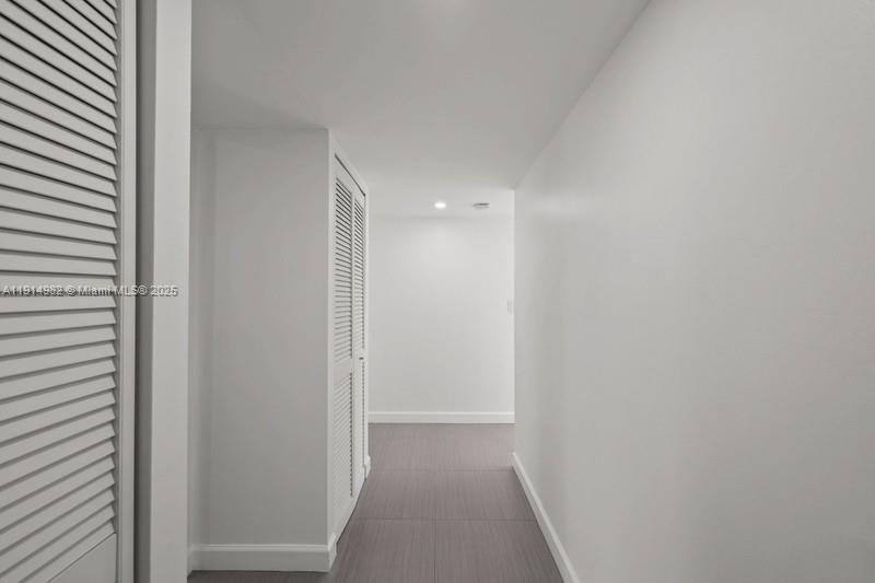 4174 Inverrary Drive, Unit 902 Lauderhill, FL 33319 - Photo 8 of 19 a view of a hallway