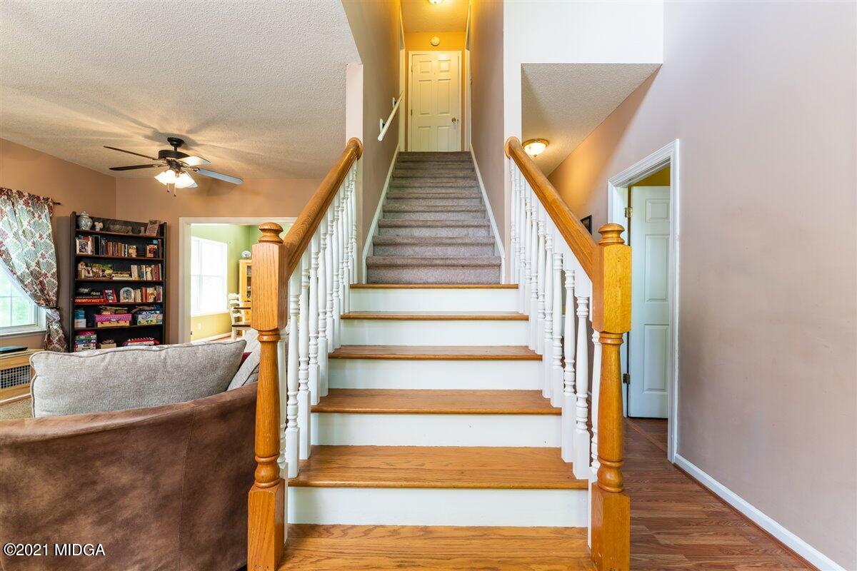 199 Woods Road Juliette, GA 31046 - Photo 23 of 38 a view of entryway and hall with wooden floor
