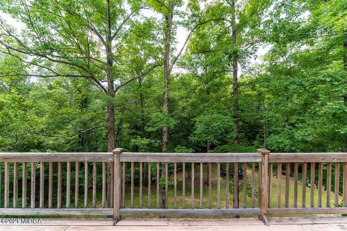 199 Woods Road Juliette, GA 31046 - Photo 31 of 38 a view of balcony with deck and trees
