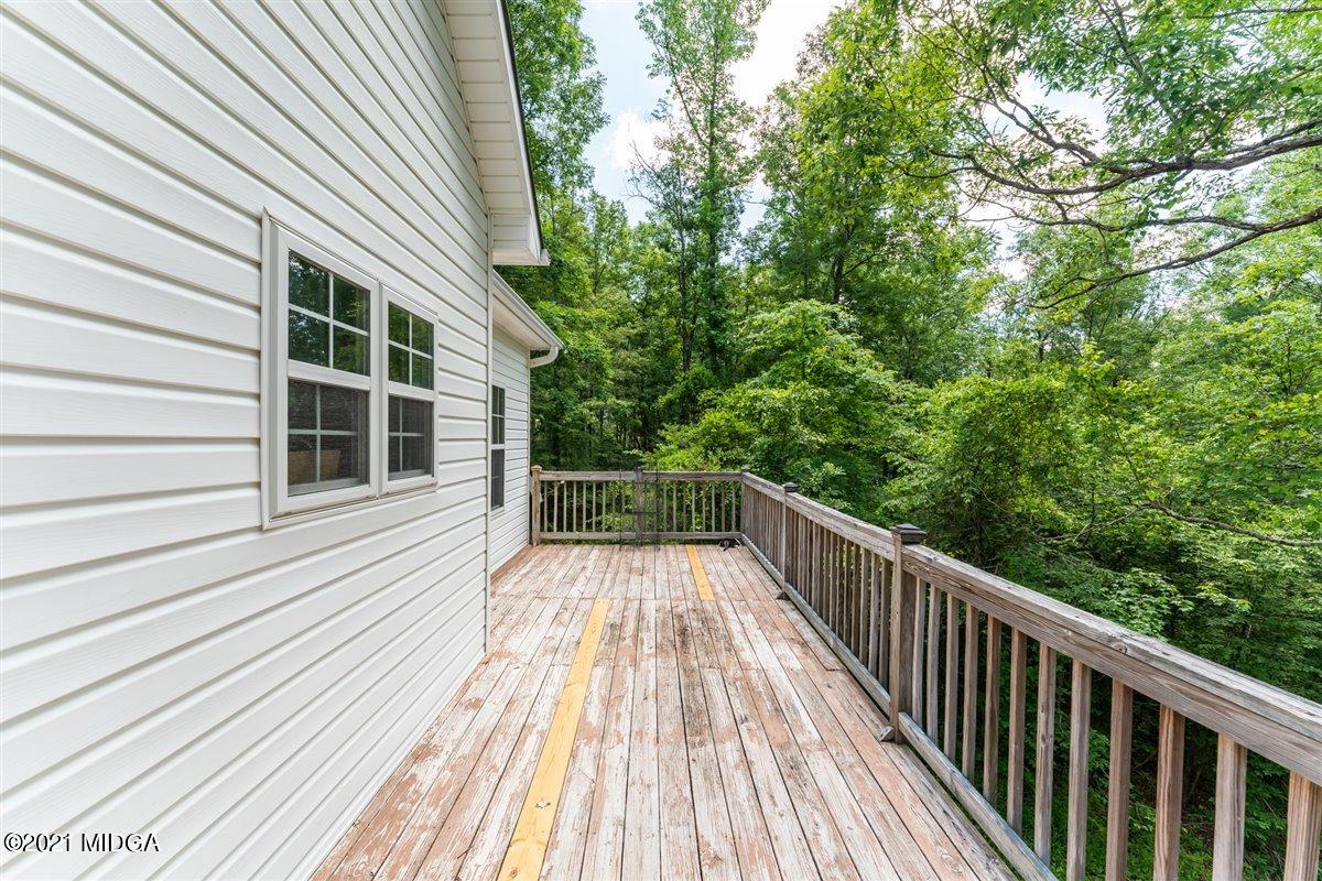 199 Woods Road Juliette, GA 31046 - Photo 32 of 38 a view of balcony with wooden floor
