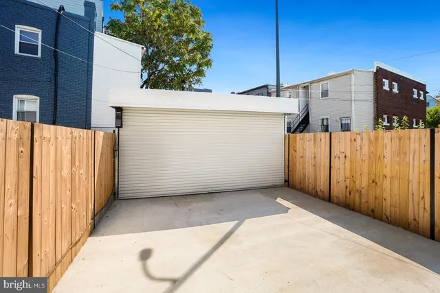 a view of a wooden door of a house