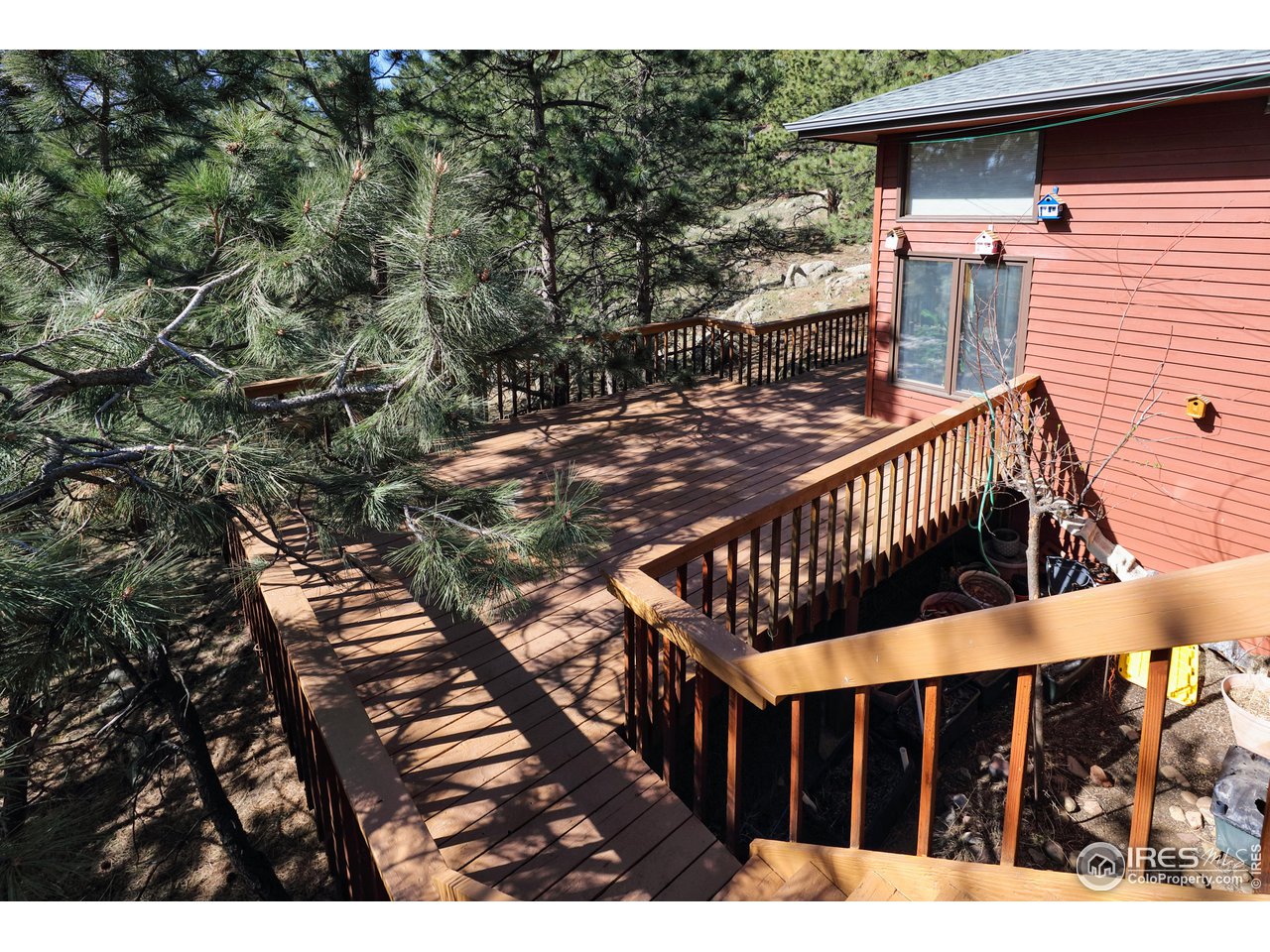 2371 Linden Drive Boulder, CO 80304 - Photo 22 of 40 a view of balcony with wooden floor and fence