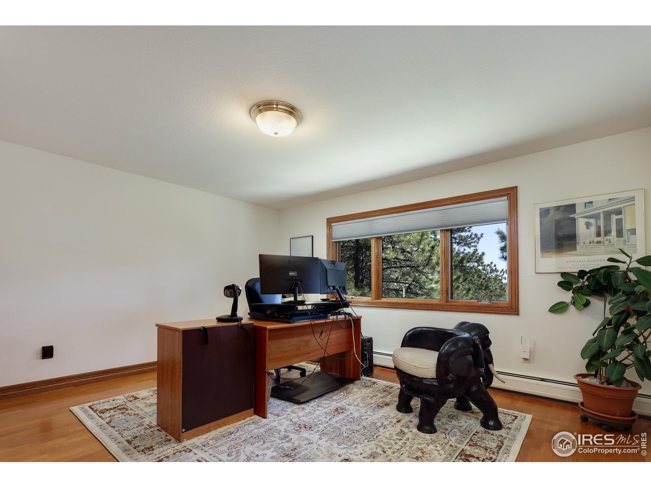 2371 Linden Drive Boulder, CO 80304 - Photo 31 of 40 a workspace with furniture and window