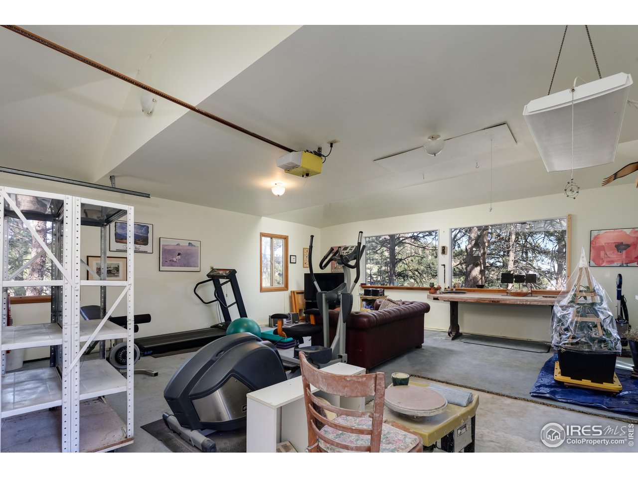 2371 Linden Drive Boulder, CO 80304 - Photo 34 of 40 a living room with furniture and a flat screen tv