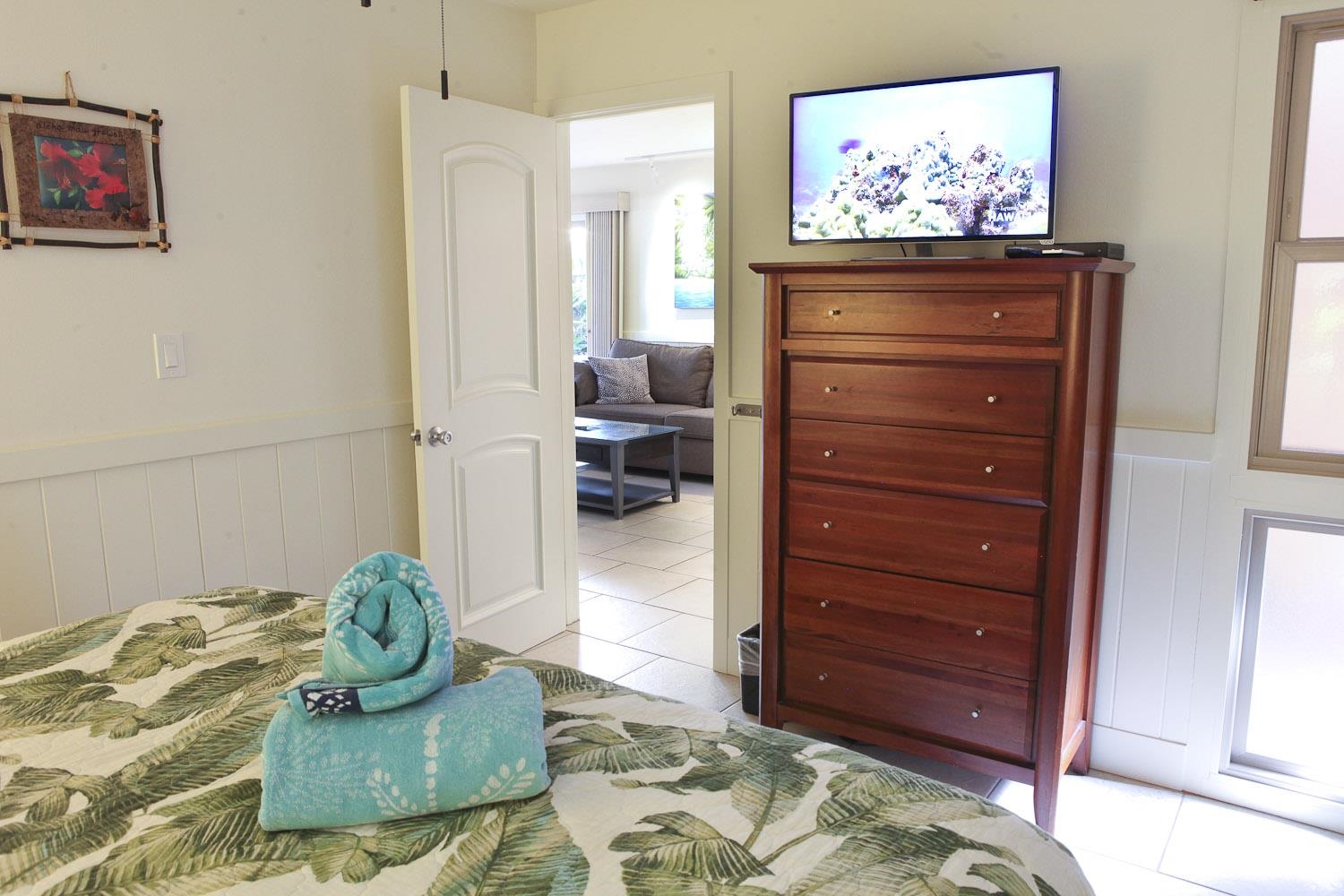 115 North Kihei Road, Unit A3 Kihei, HI 96753 - Photo 14 of 21 a living room with furniture and a dresser