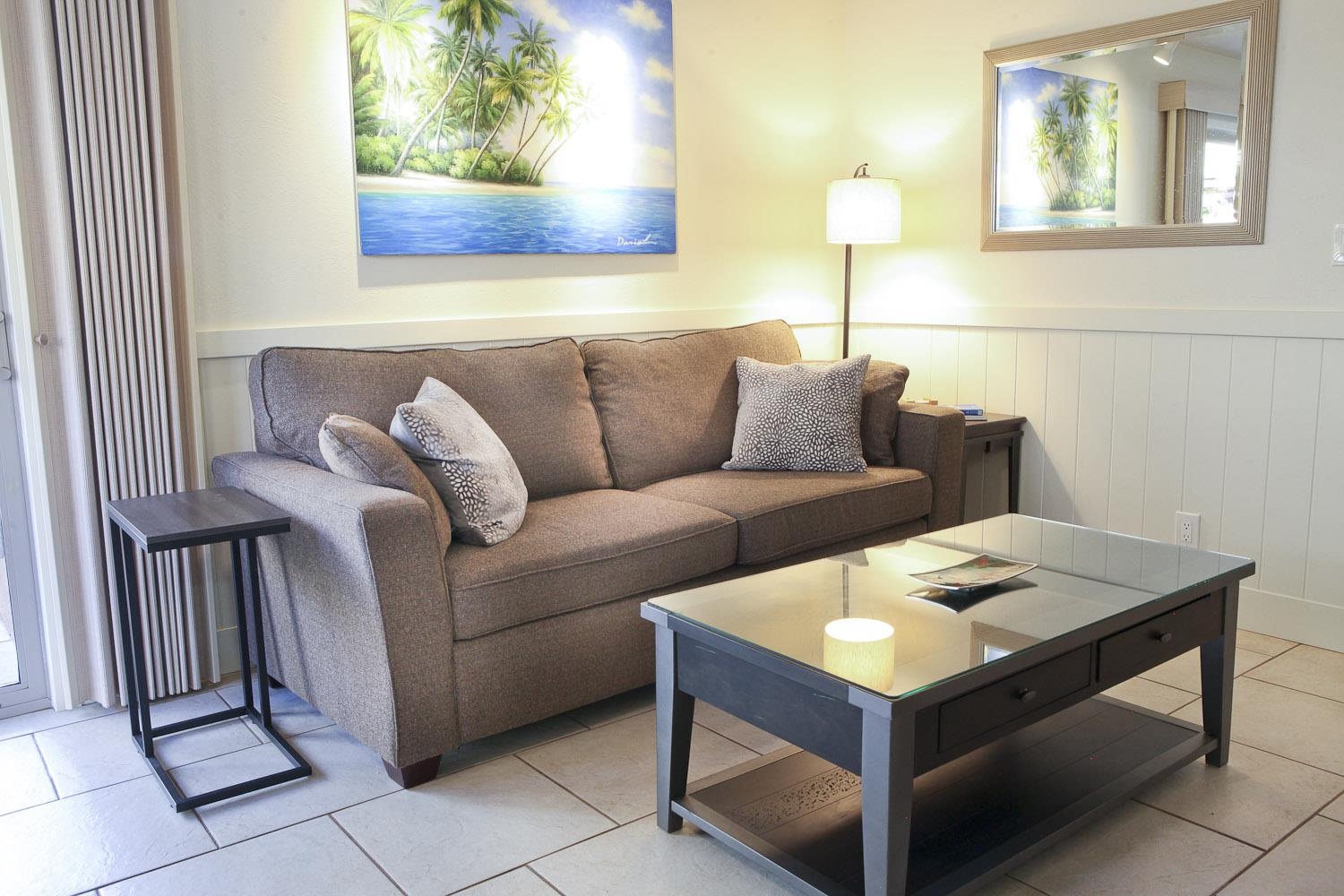 115 North Kihei Road, Unit A3 Kihei, HI 96753 - Photo 4 of 21 a living room with furniture and a window