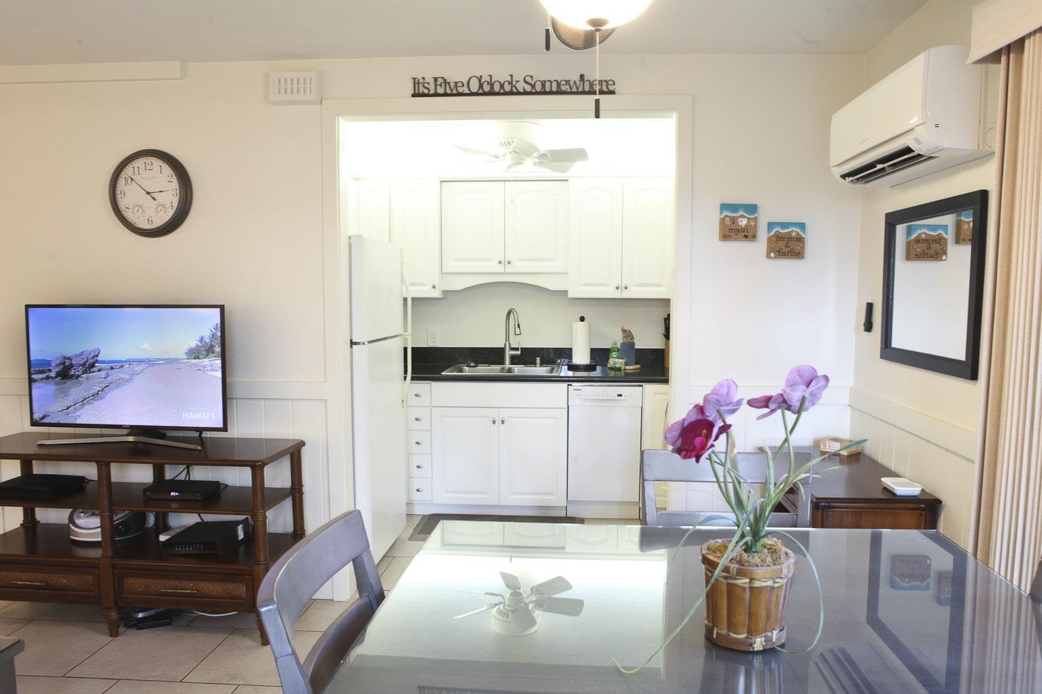 115 North Kihei Road, Unit A3 Kihei, HI 96753 - Photo 7 of 21 a living room with furniture and flowers