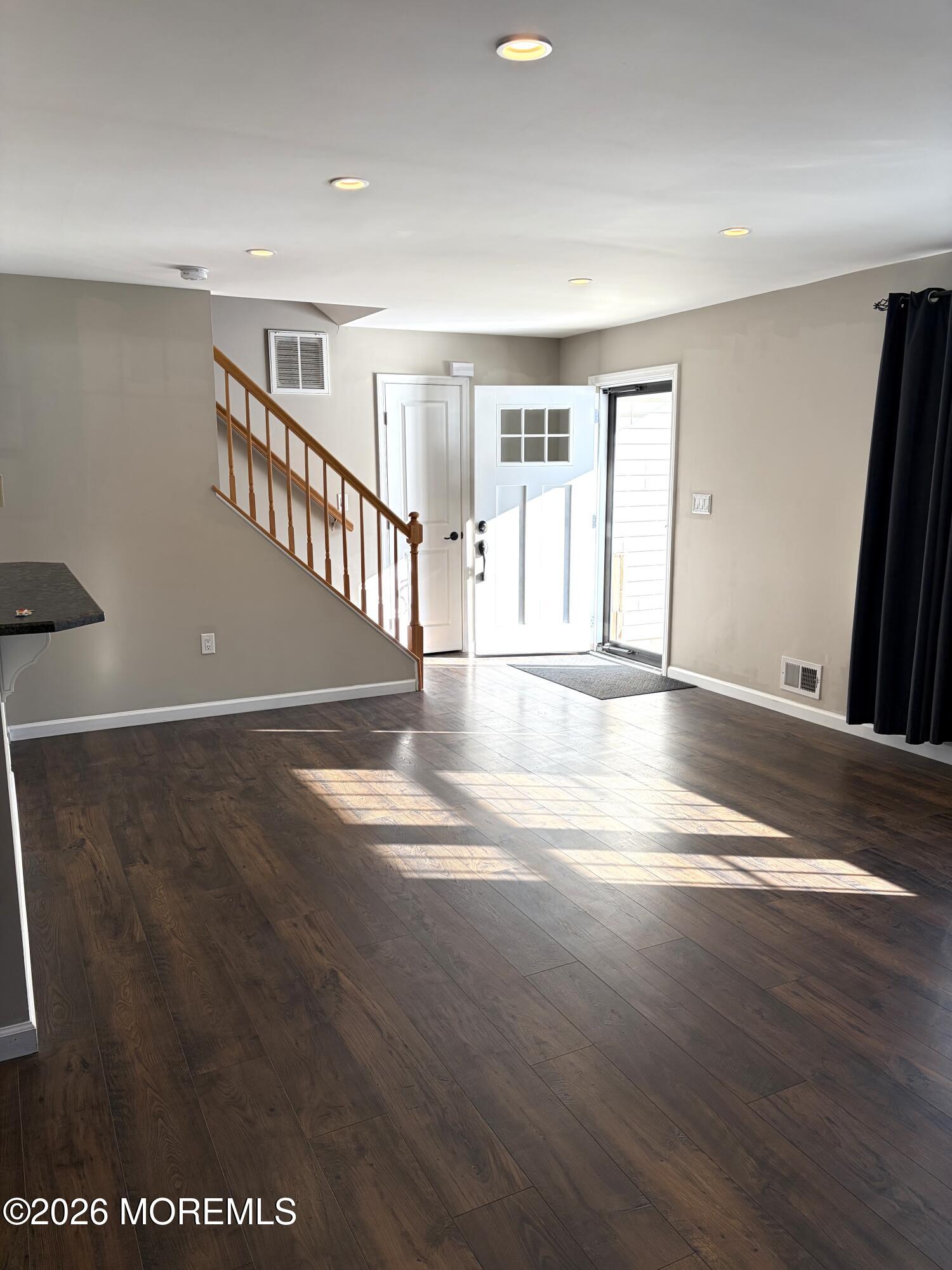 295 Flaam Street Toms River, NJ 08753 - Photo 13 of 30 a view of an entryway with wooden floor