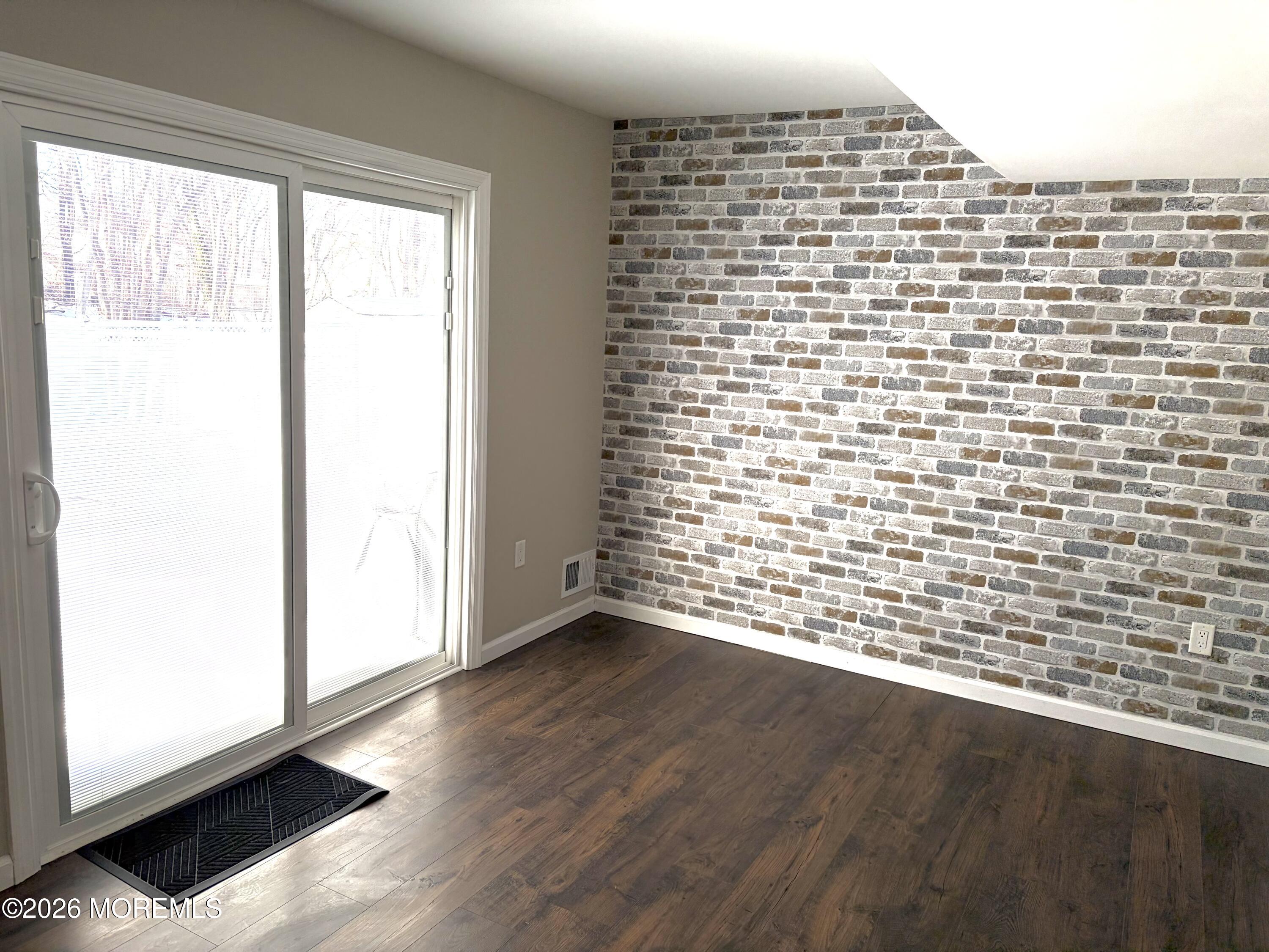 295 Flaam Street Toms River, NJ 08753 - Photo 16 of 30 a view of a wooden floor with a window