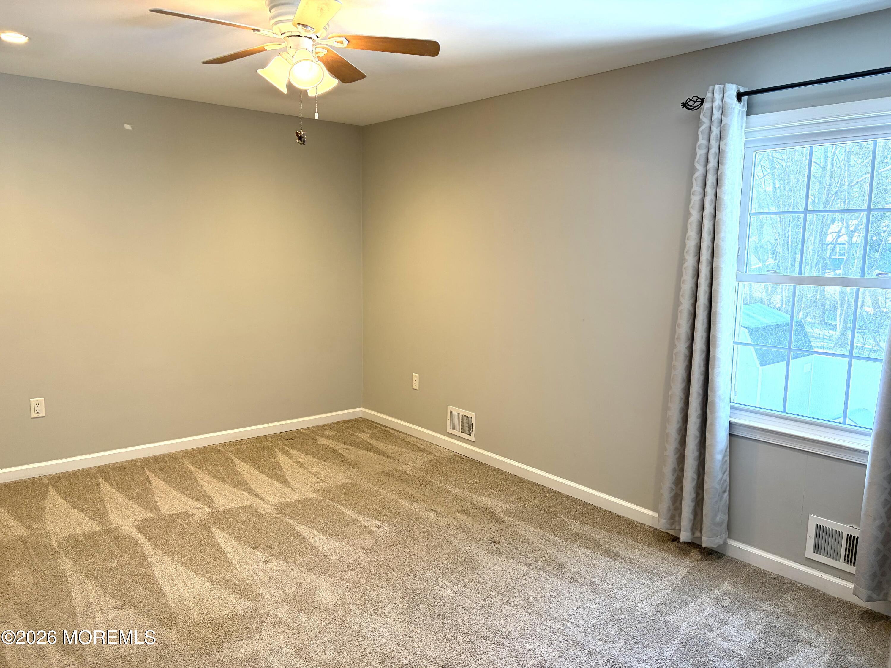 295 Flaam Street Toms River, NJ 08753 - Photo 18 of 30 an empty room with a window