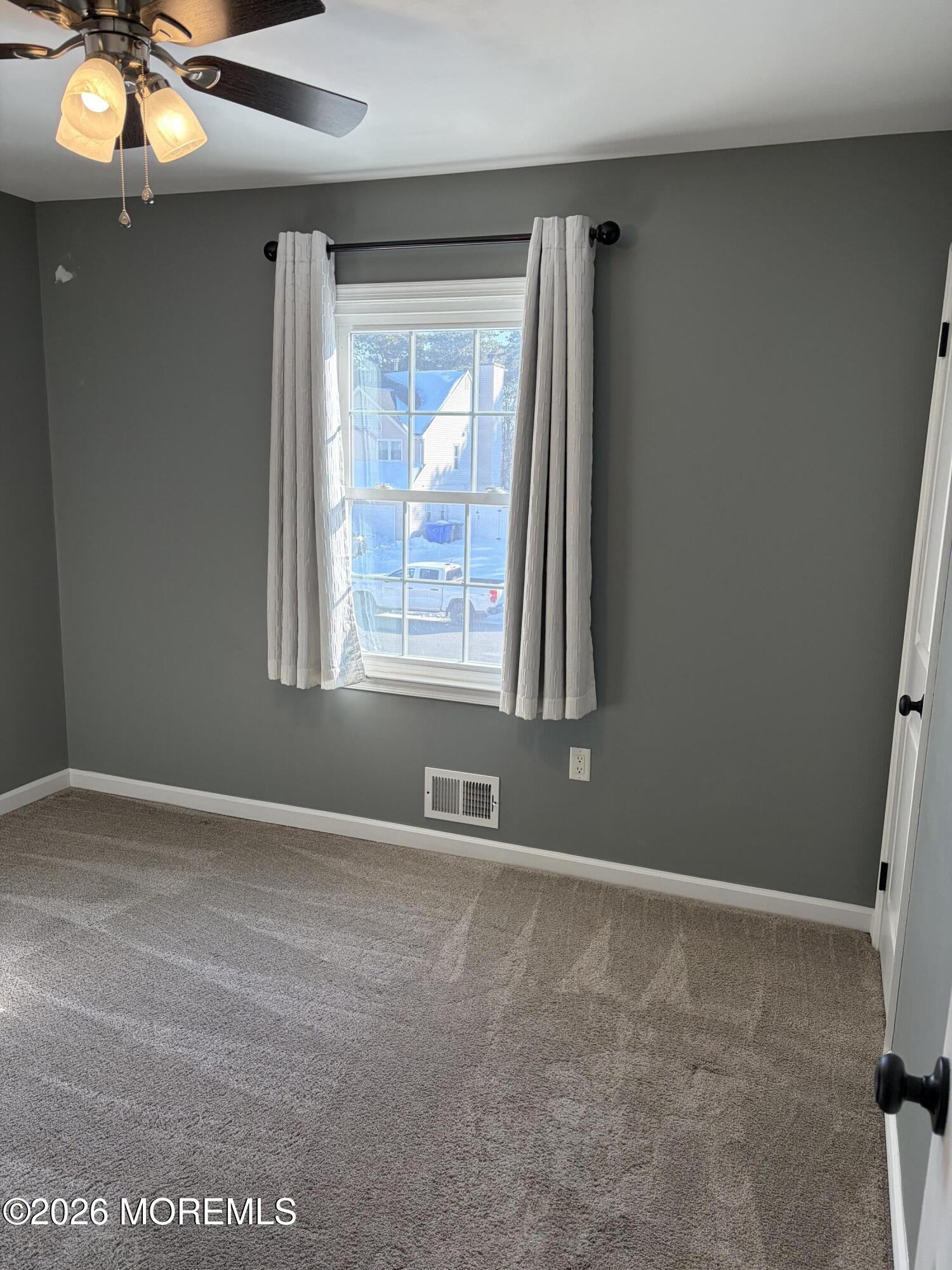 295 Flaam Street Toms River, NJ 08753 - Photo 21 of 30 a view of an empty room with a window