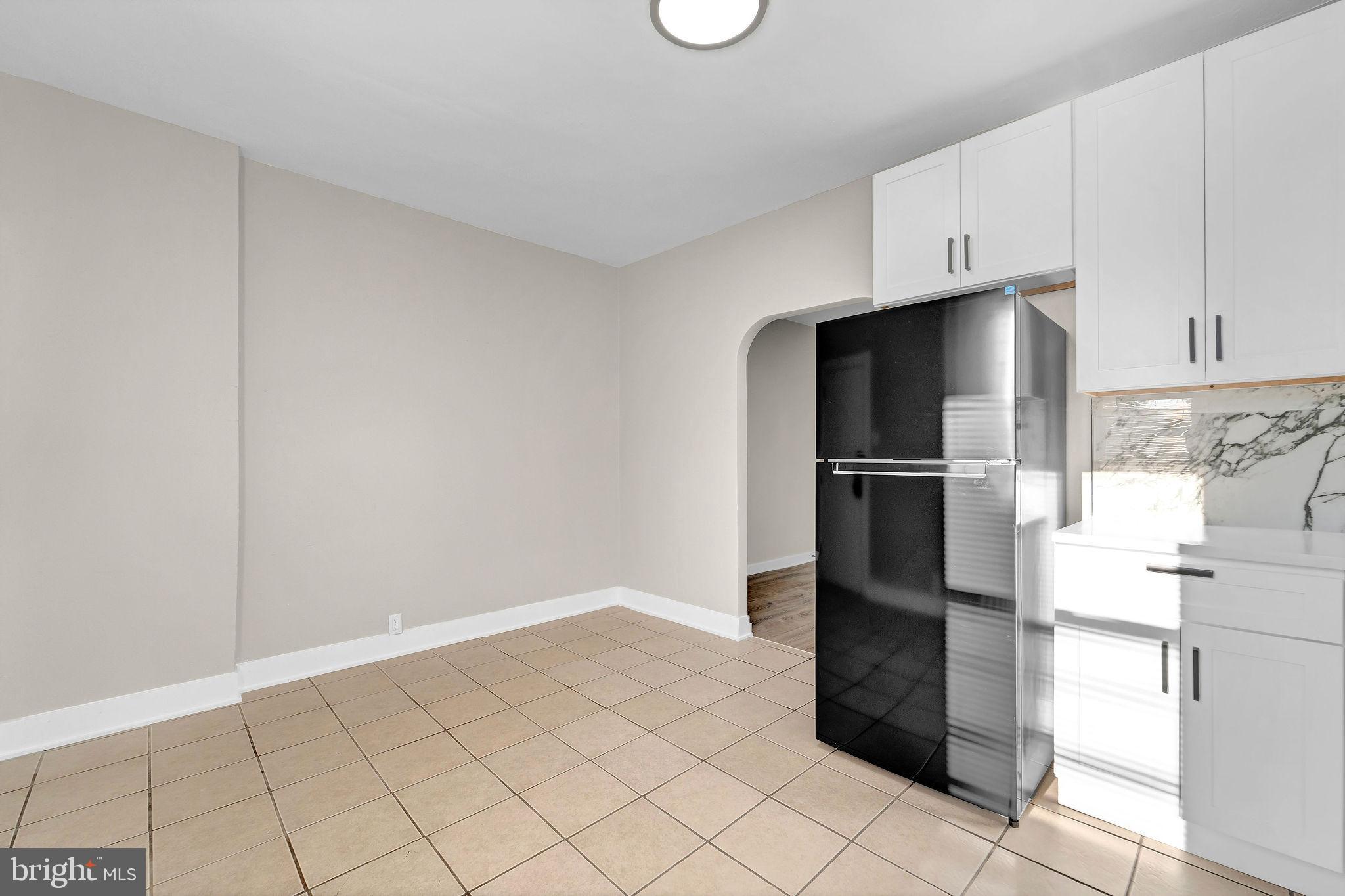 2791 Yorkship Road Camden, NJ 08104 - Photo 14 of 33 a view of kitchen with refrigerator