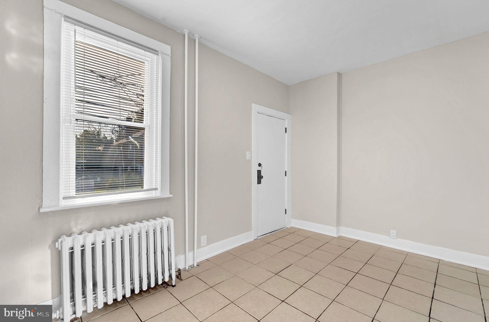 2791 Yorkship Road Camden, NJ 08104 - Photo 15 of 33 a view of an empty room and window