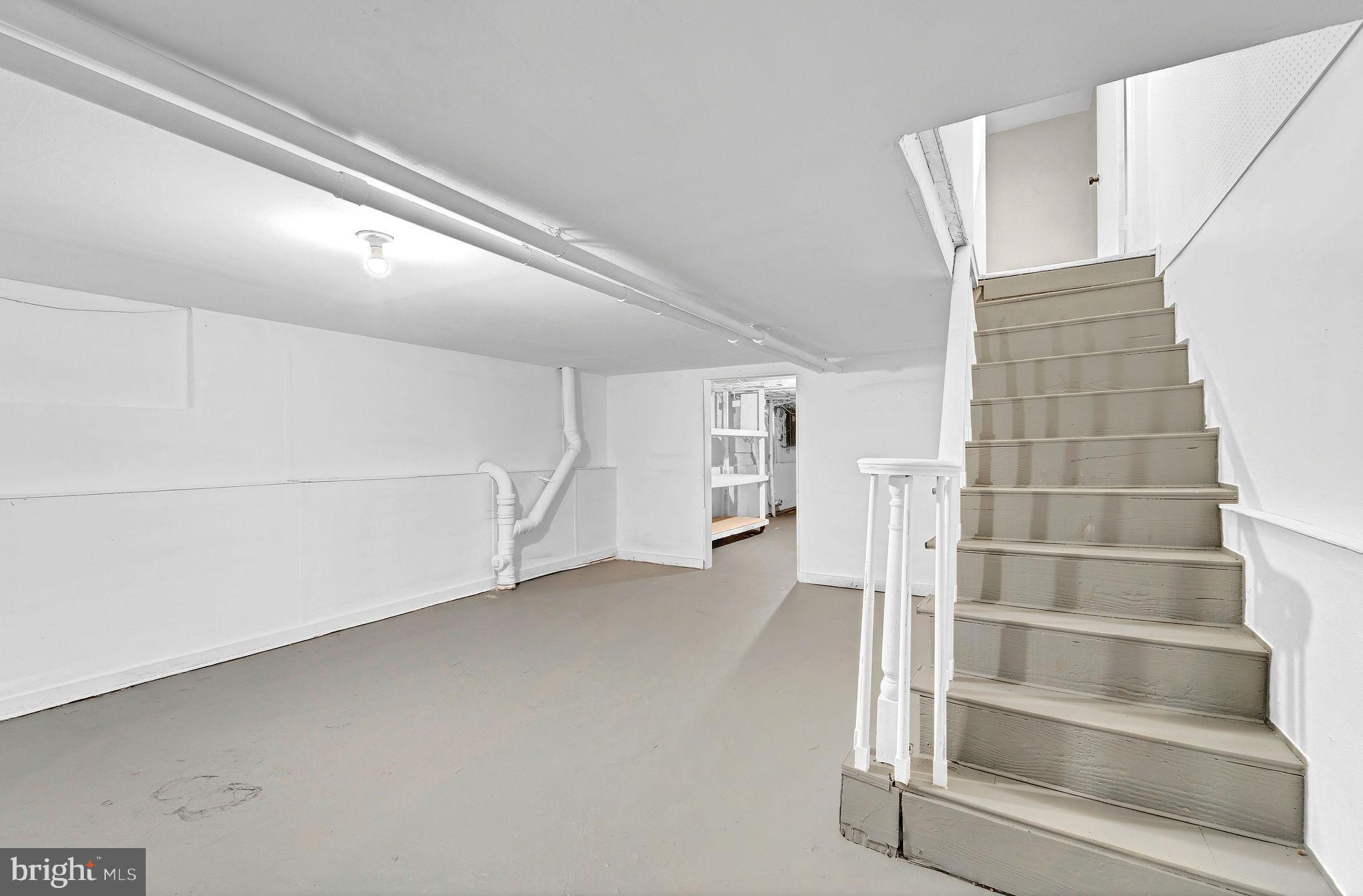 2791 Yorkship Road Camden, NJ 08104 - Photo 25 of 33 a view of an empty room with wooden floor and entryway