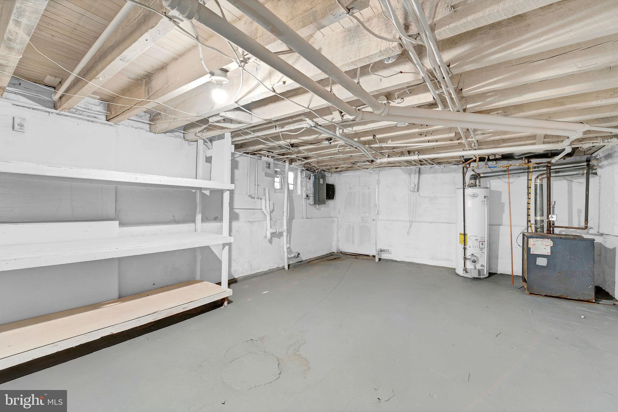 2791 Yorkship Road Camden, NJ 08104 - Photo 26 of 33 a view of an empty room with racks on the wall