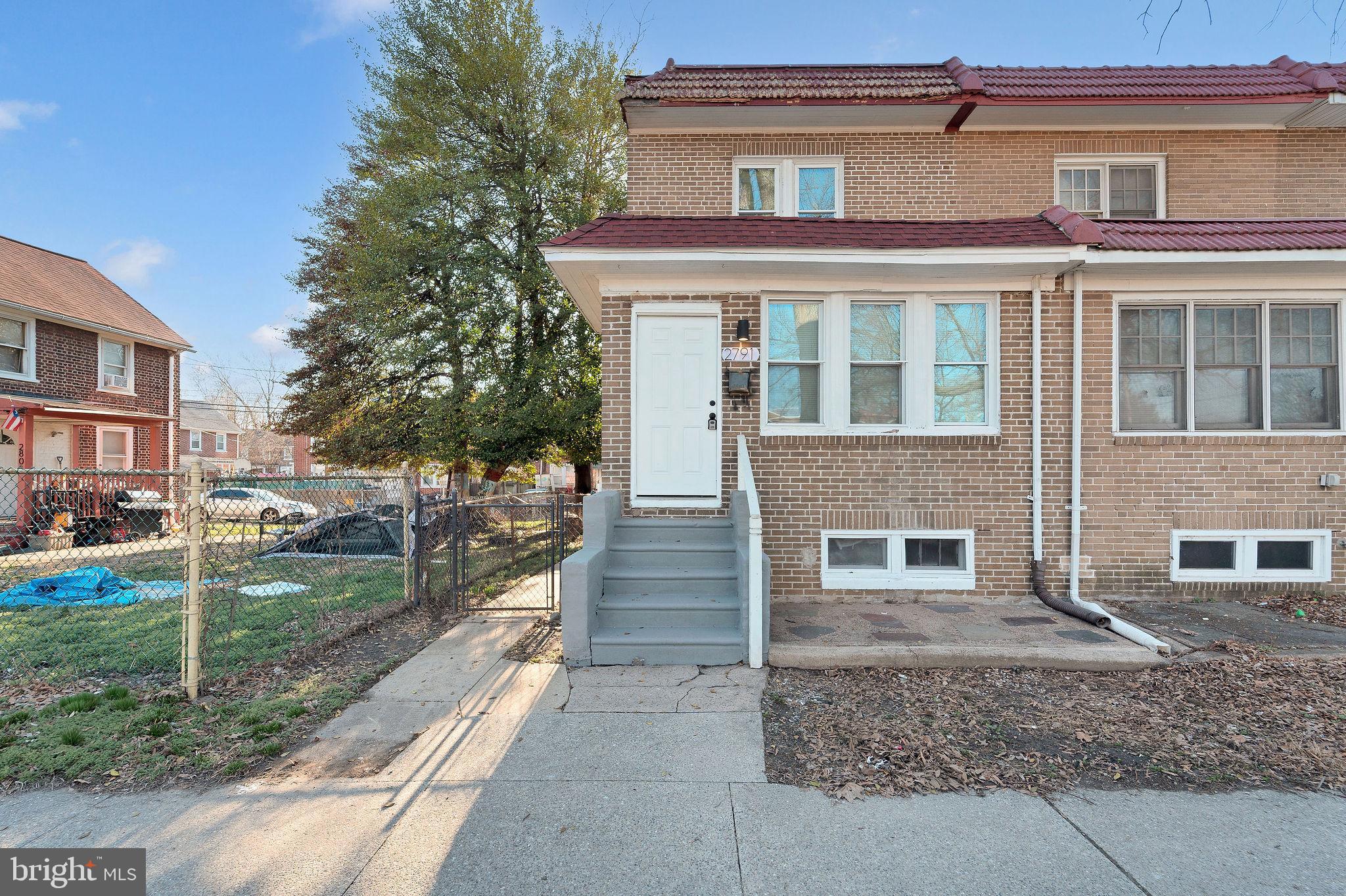 2791 Yorkship Road Camden, NJ 08104 - Photo 3 of 33 a front view of a house with a yard