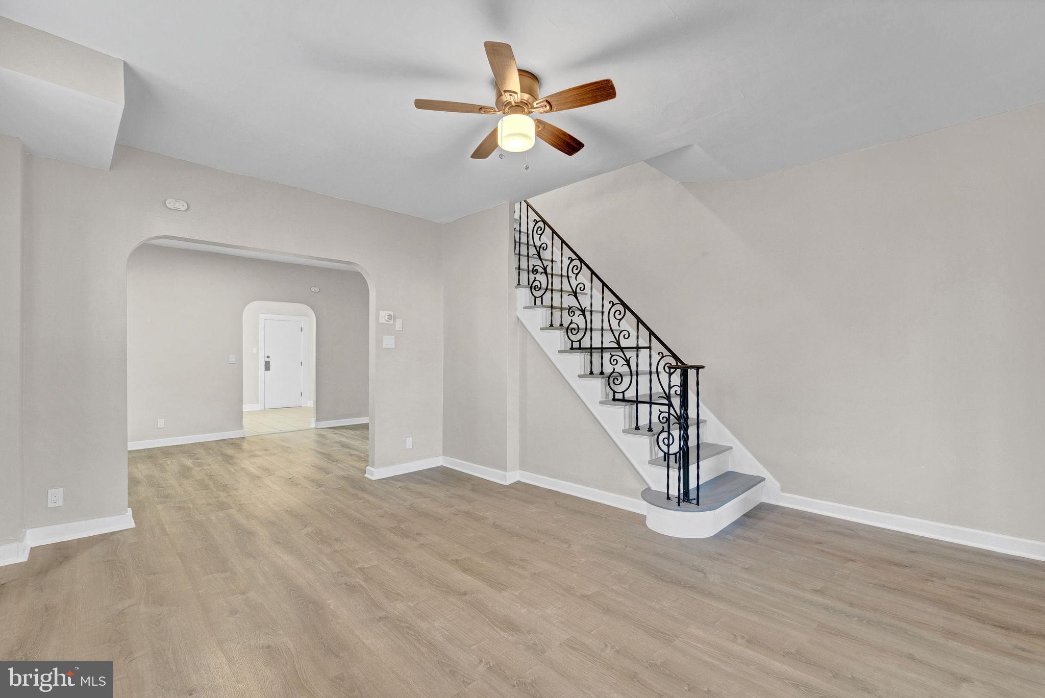 2791 Yorkship Road Camden, NJ 08104 - Photo 7 of 33 a view of an empty room with wooden floor