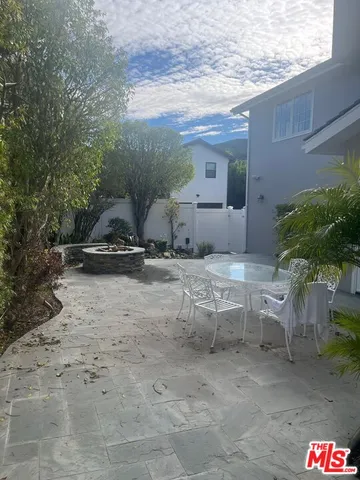 a view of backyard and outdoor space