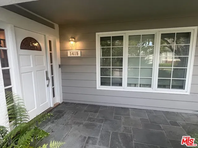 a front view of a house with a window