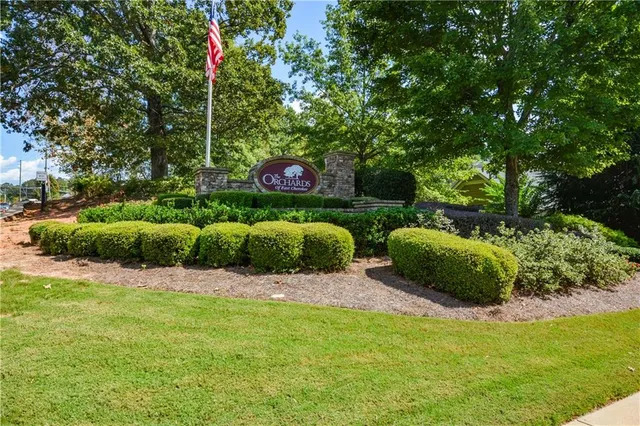 an aerial view of a house with a garden