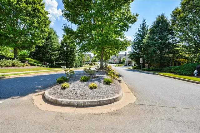 an aerial view of a house with a swimming pool