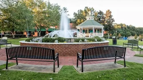 a view of a chairs and table in the patio