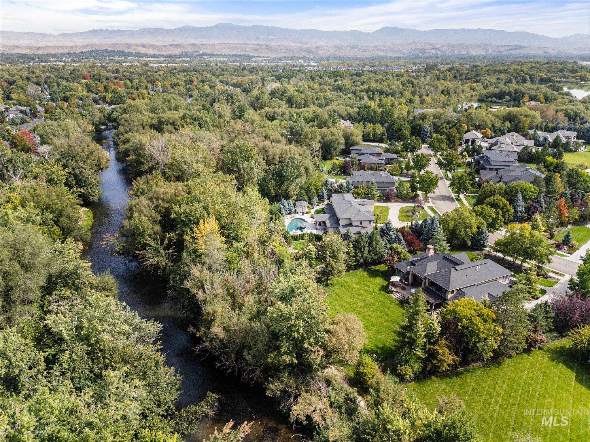 226 East Riversedge Drive Eagle, ID 83616 - Photo 4 of 50 Drone / aerial view of a water and mountain view