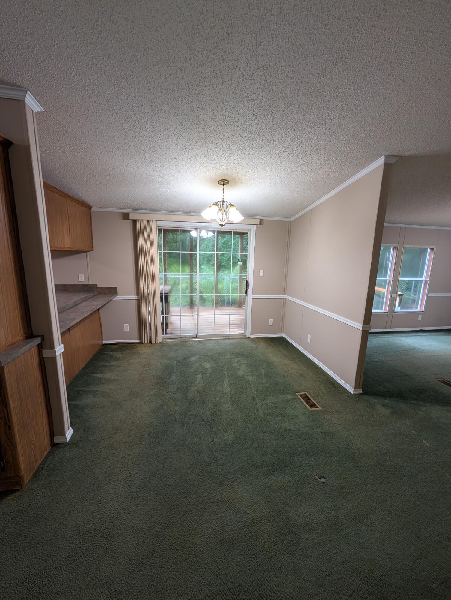 157 East Harborview Road Santa Rosa Beach, FL 32459 - Photo 11 of 27 a view of an empty room with a window