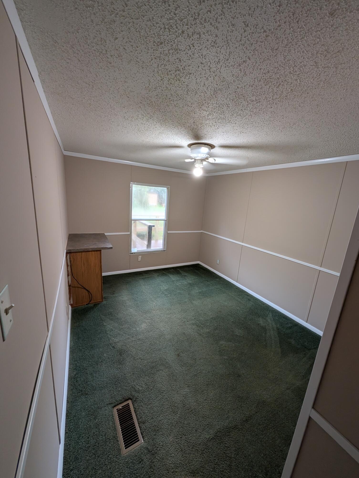 157 East Harborview Road Santa Rosa Beach, FL 32459 - Photo 24 of 27 a view of room with window and stairs