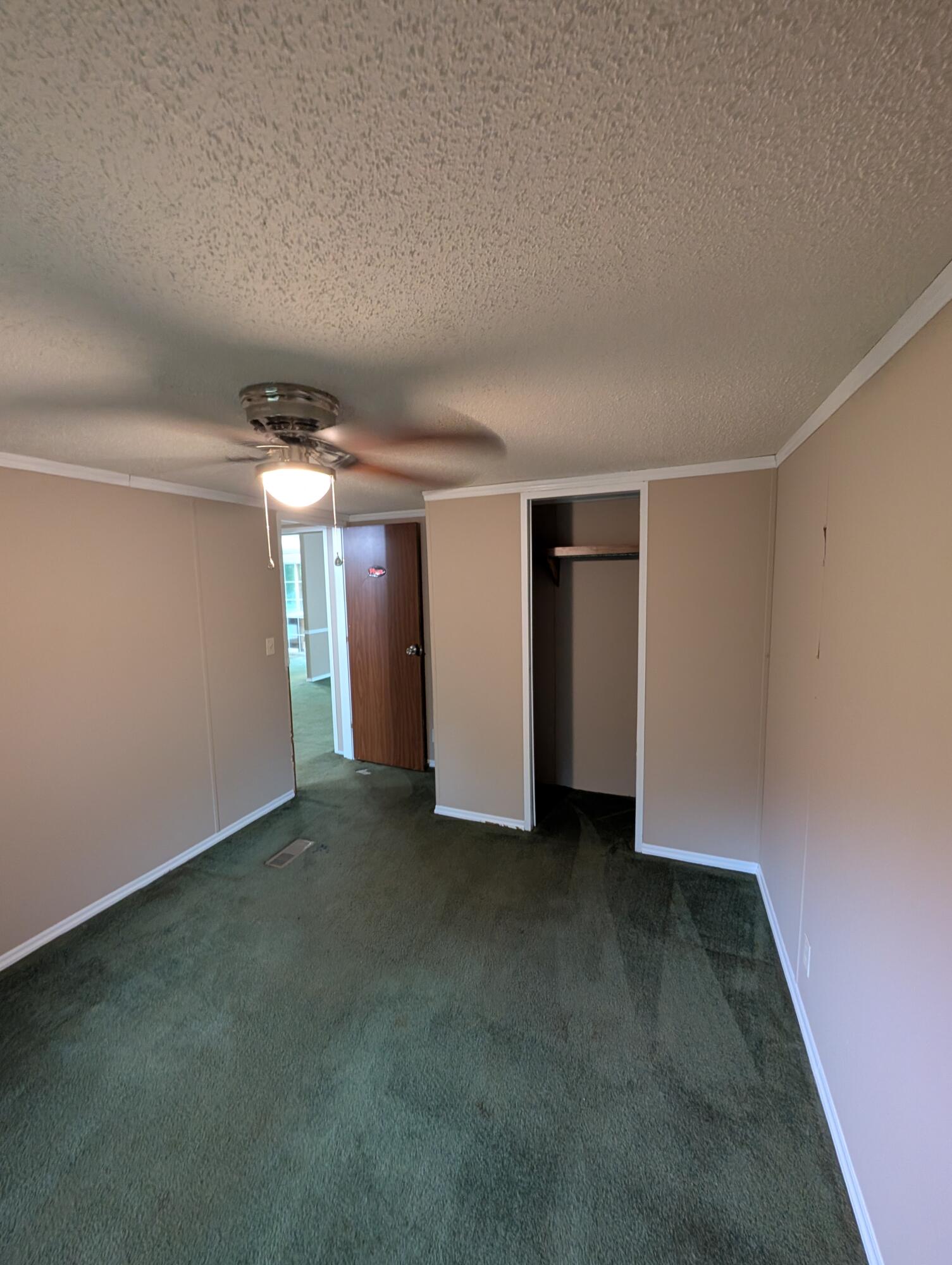 157 East Harborview Road Santa Rosa Beach, FL 32459 - Photo 26 of 27 an empty room with a empty space and windows