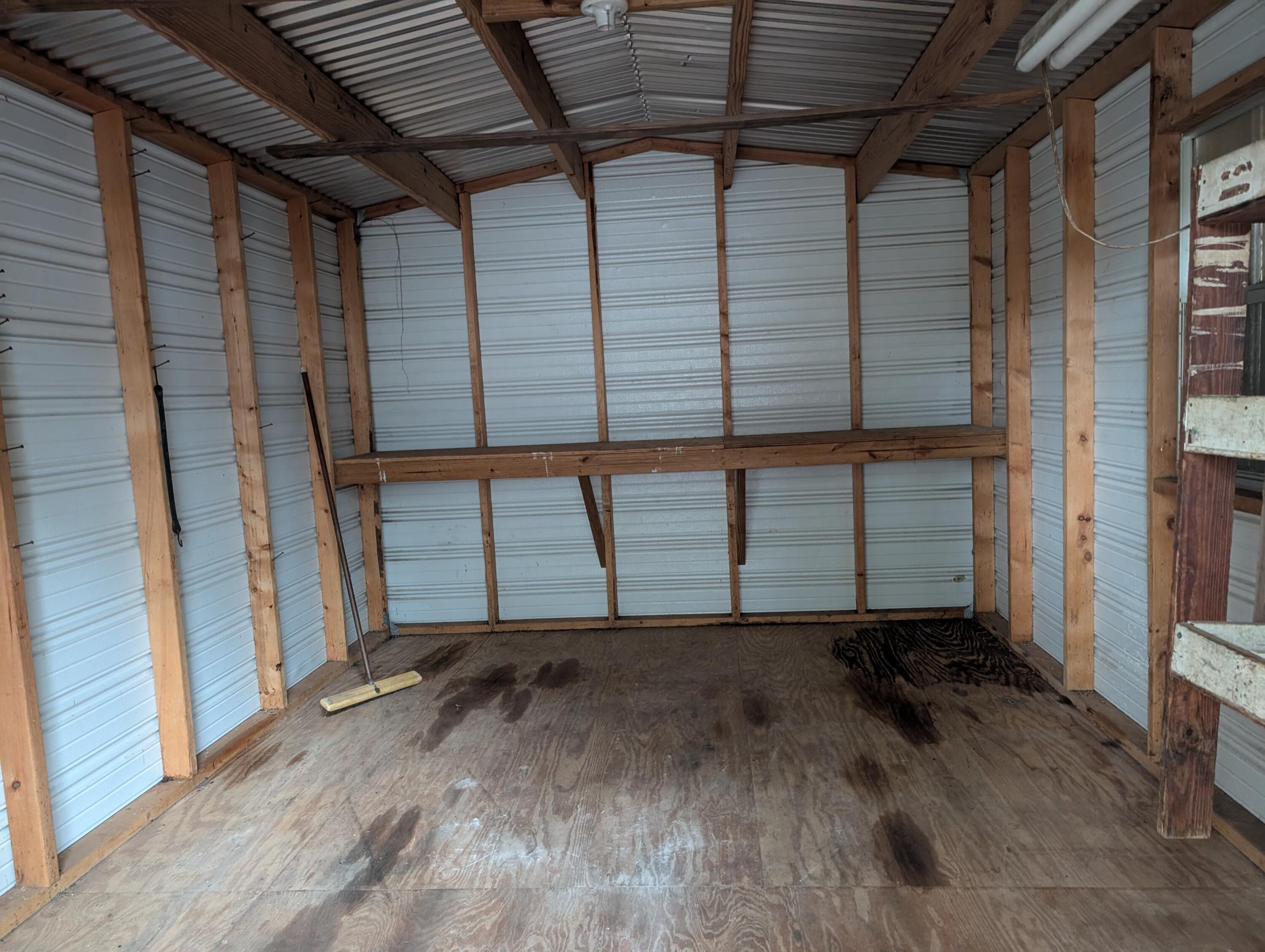 157 East Harborview Road Santa Rosa Beach, FL 32459 - Photo 4 of 27 a view of a room with wooden walls