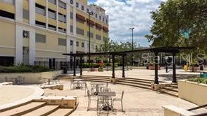 a kitchen with a sink and refrigerator