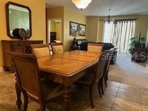 a view of a dining room with furniture