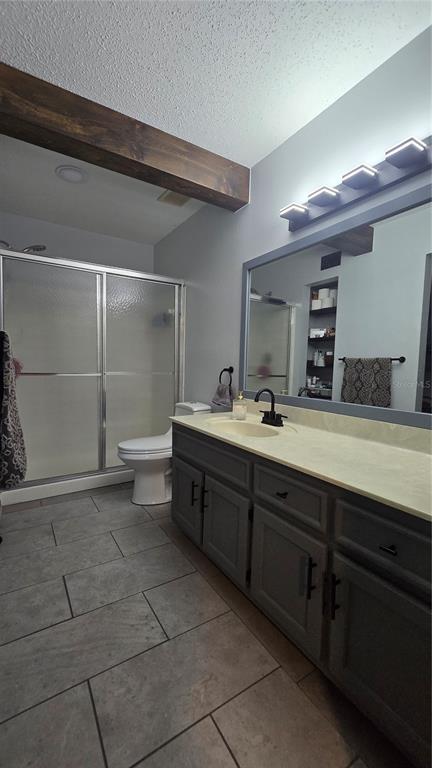 406 Lennox Road West Palm Harbor, FL 34683 - Photo 17 of 40 a bathroom with a double vanity sink and a mirror