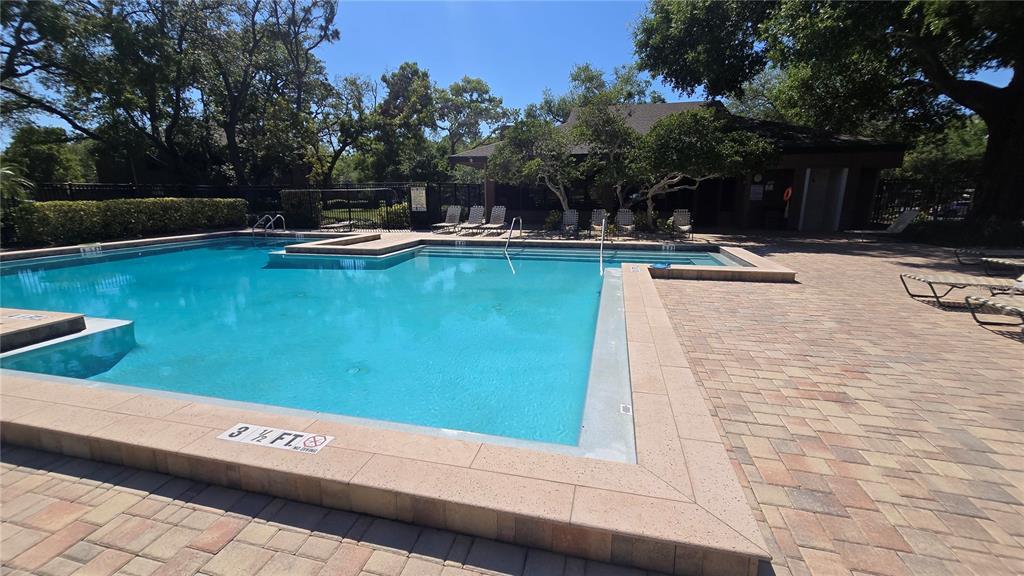 406 Lennox Road West Palm Harbor, FL 34683 - Photo 36 of 40 a view of swimming pool with chairs