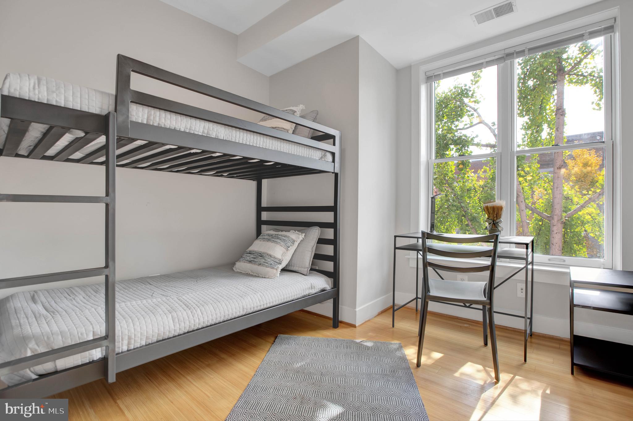 1801 Swann Street Northwest, Unit 302 Washington, DC 20009 - Photo 11 of 24 Light filled second bedroom
