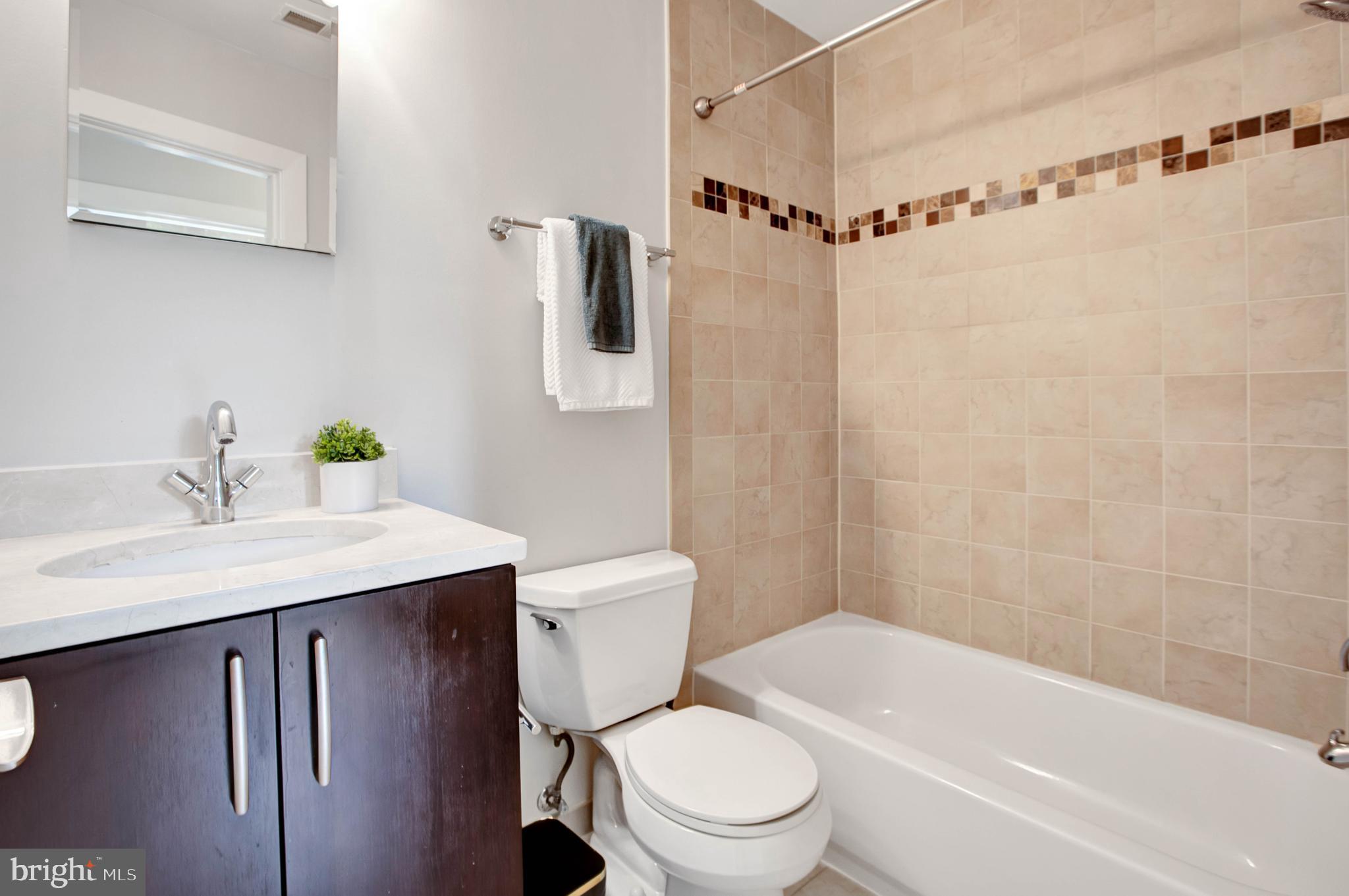 1801 Swann Street Northwest, Unit 302 Washington, DC 20009 - Photo 12 of 24 Renovated bathroom
