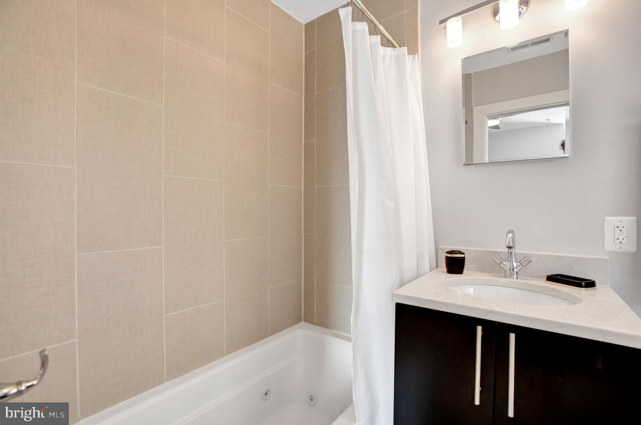 1801 Swann Street Northwest, Unit 302 Washington, DC 20009 - Photo 16 of 24 In-suite master bathroom