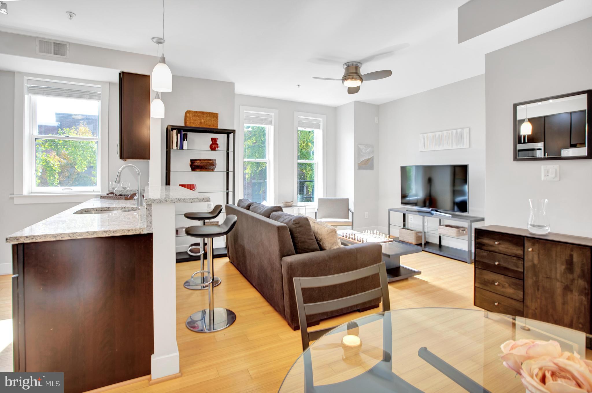 1801 Swann Street Northwest, Unit 302 Washington, DC 20009 - Photo 2 of 24 Modern open concept kitchen, DR and LR