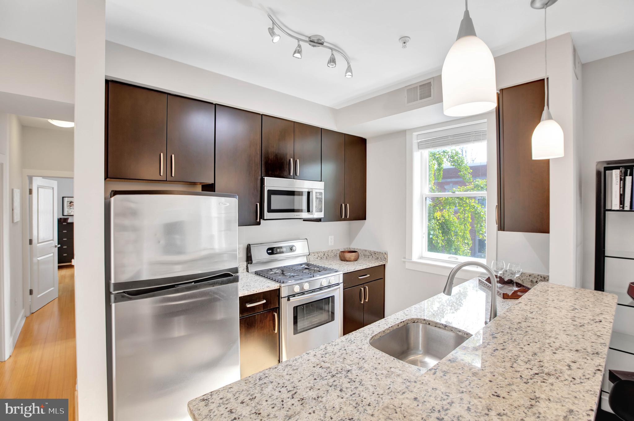 1801 Swann Street Northwest, Unit 302 Washington, DC 20009 - Photo 8 of 24 stainless steel appliances