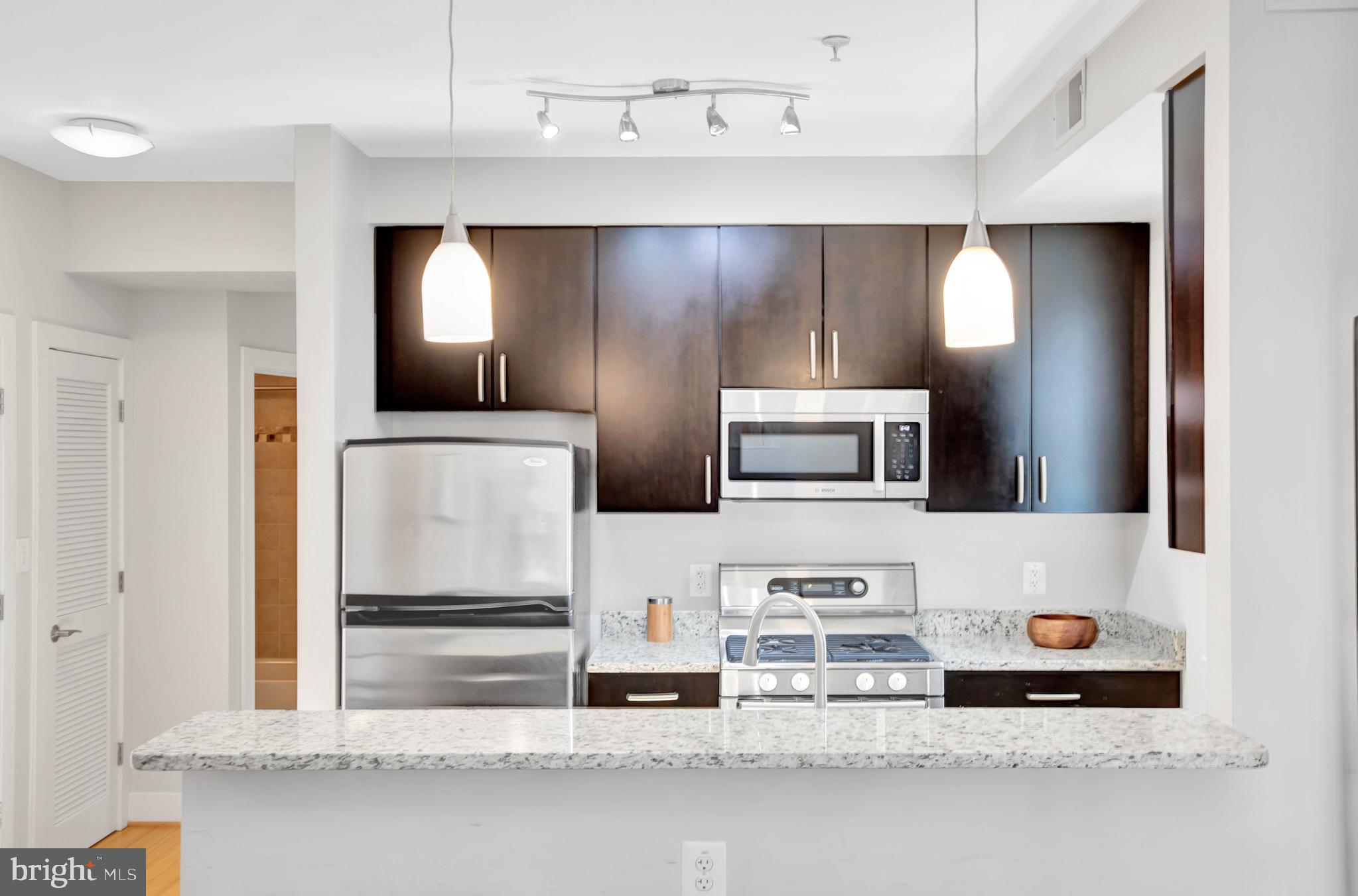 1801 Swann Street Northwest, Unit 302 Washington, DC 20009 - Photo 10 of 24 Comfortable breakfast bar